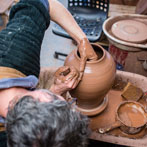 Doug Fitch and Hannah McAndrew making a jug for me